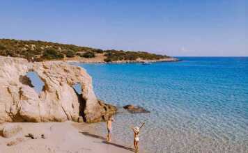 beaches in athens greece couple on the beach