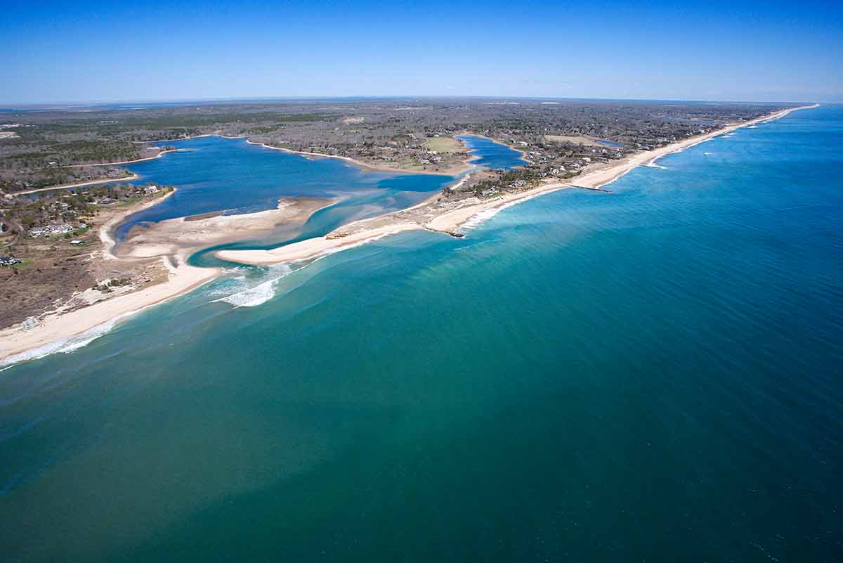 beaches in new york aerial view of Southampton, New York with shoal and inlet.