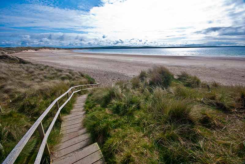 beaches in scotland timber steps to the sand on Dunnet Bay