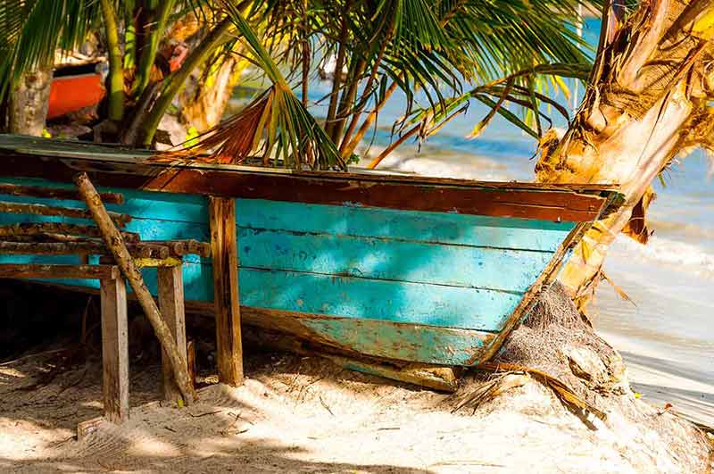 beached canoes are typical sights on the beaches of colombia