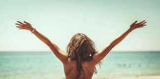 naked woman popping out through the roof of her car