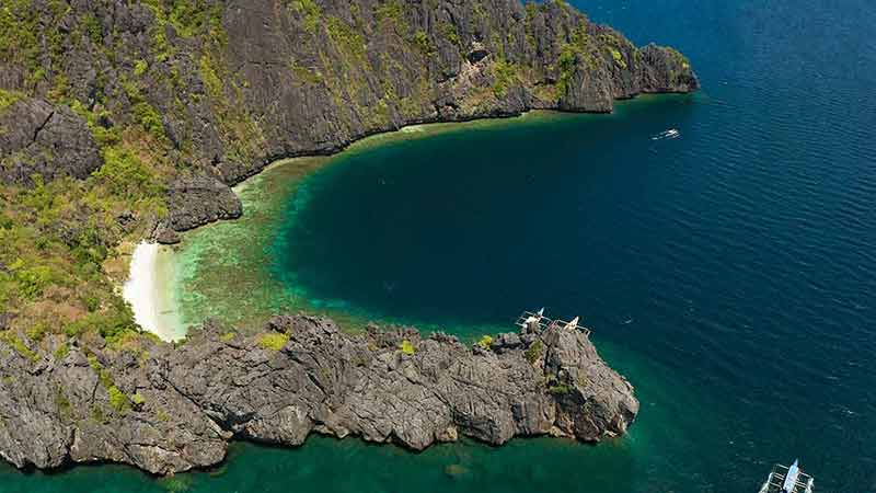 beaches to visit in asia El nido aerial of lagoon, cliffs and beach