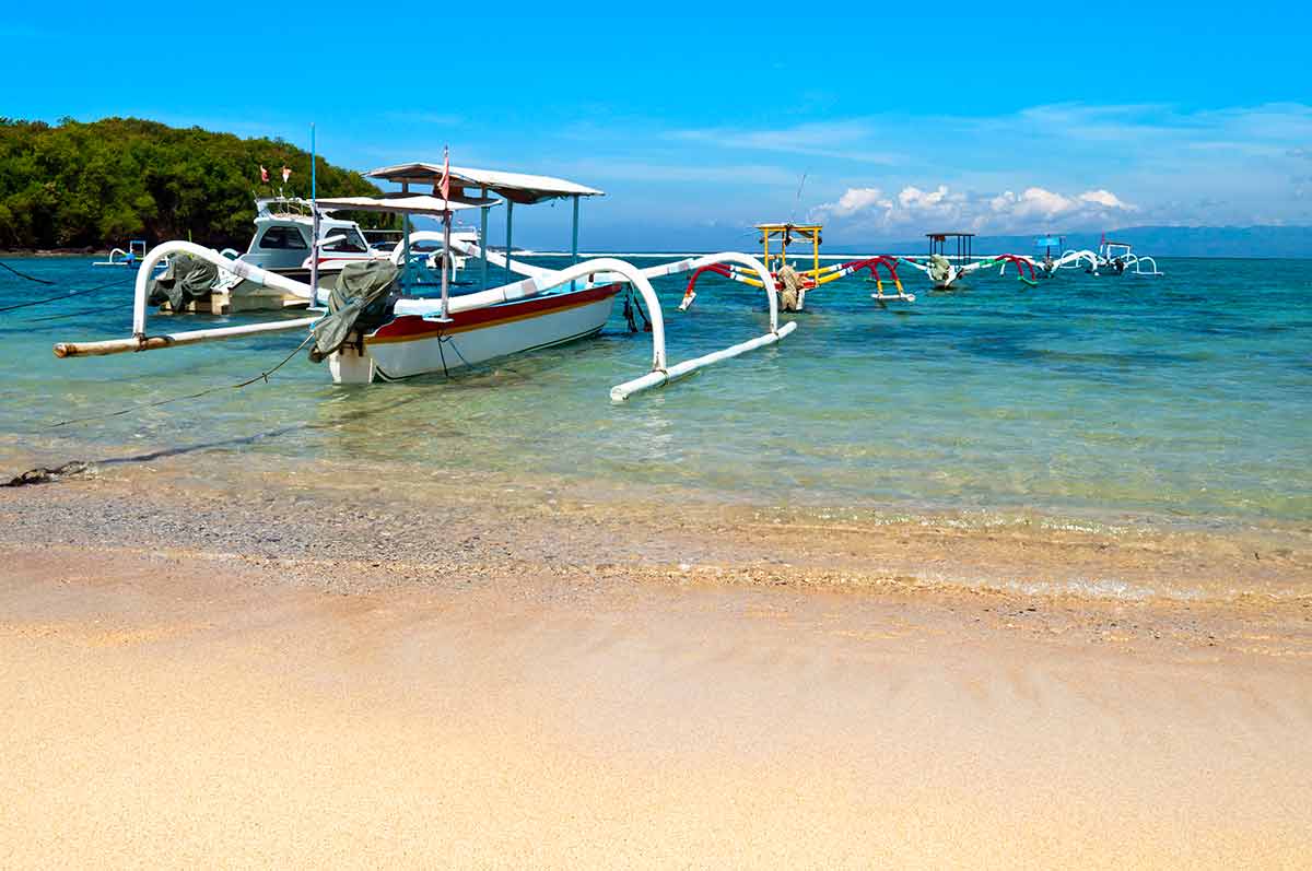 best beaches in indonesia traditional boats in Gili island
