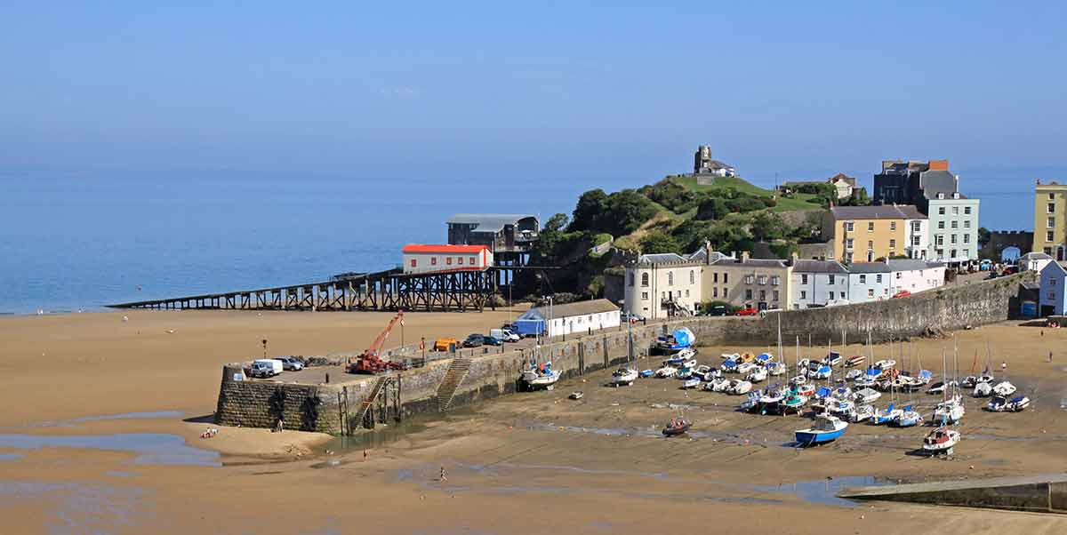best beaches in new south wales Tenby Harbour, with the tide out