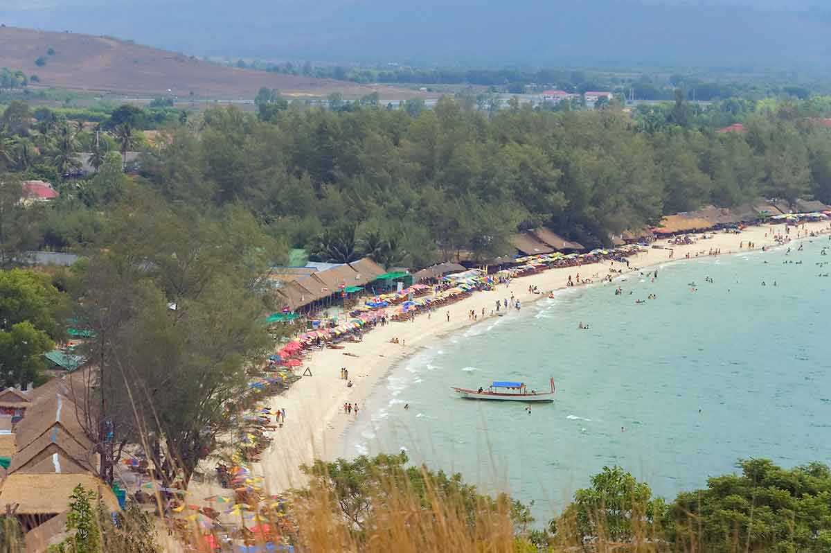 best beaches in sihanoukville cambodia aerial of tourist beach strip with stalls lining the sand