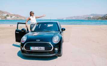 best beaches to visit in mykonos woman on a road trip, Mini car on the beach