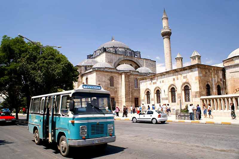 Konya bus passing a mosque