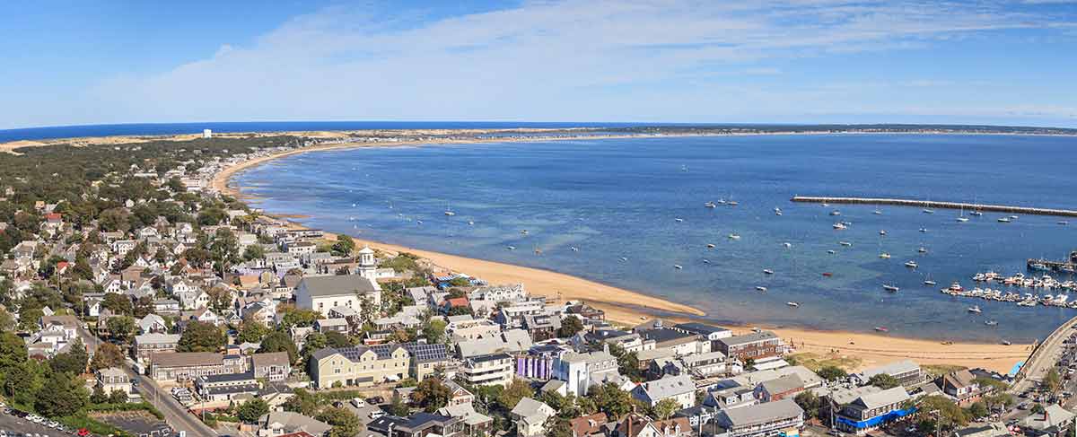 best day trips from boston Provincetown, Massachusetts, Cape Cod city view and beach and ocean aerial view from above.