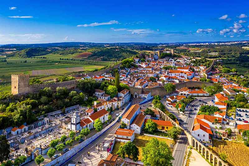 best day trips from lisbon Aerial shot of Obidos Medieval Town