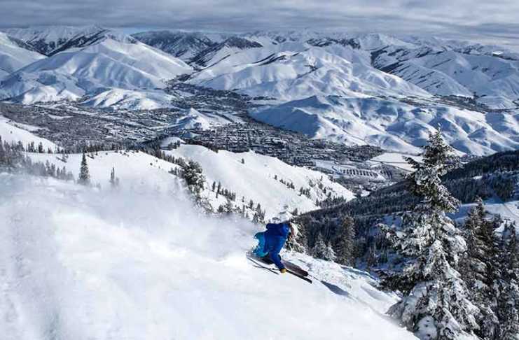 Idaho Ski Resorts You’ll Want to Visit Before Everyone Else Finds Them best idaho ski resorts sun valley expert skiing down the mountain