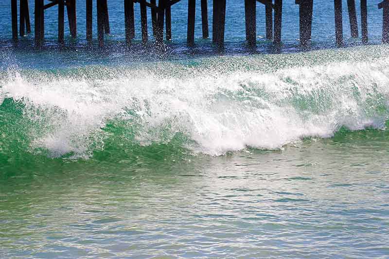 best new york beaches waves break about the pier pile