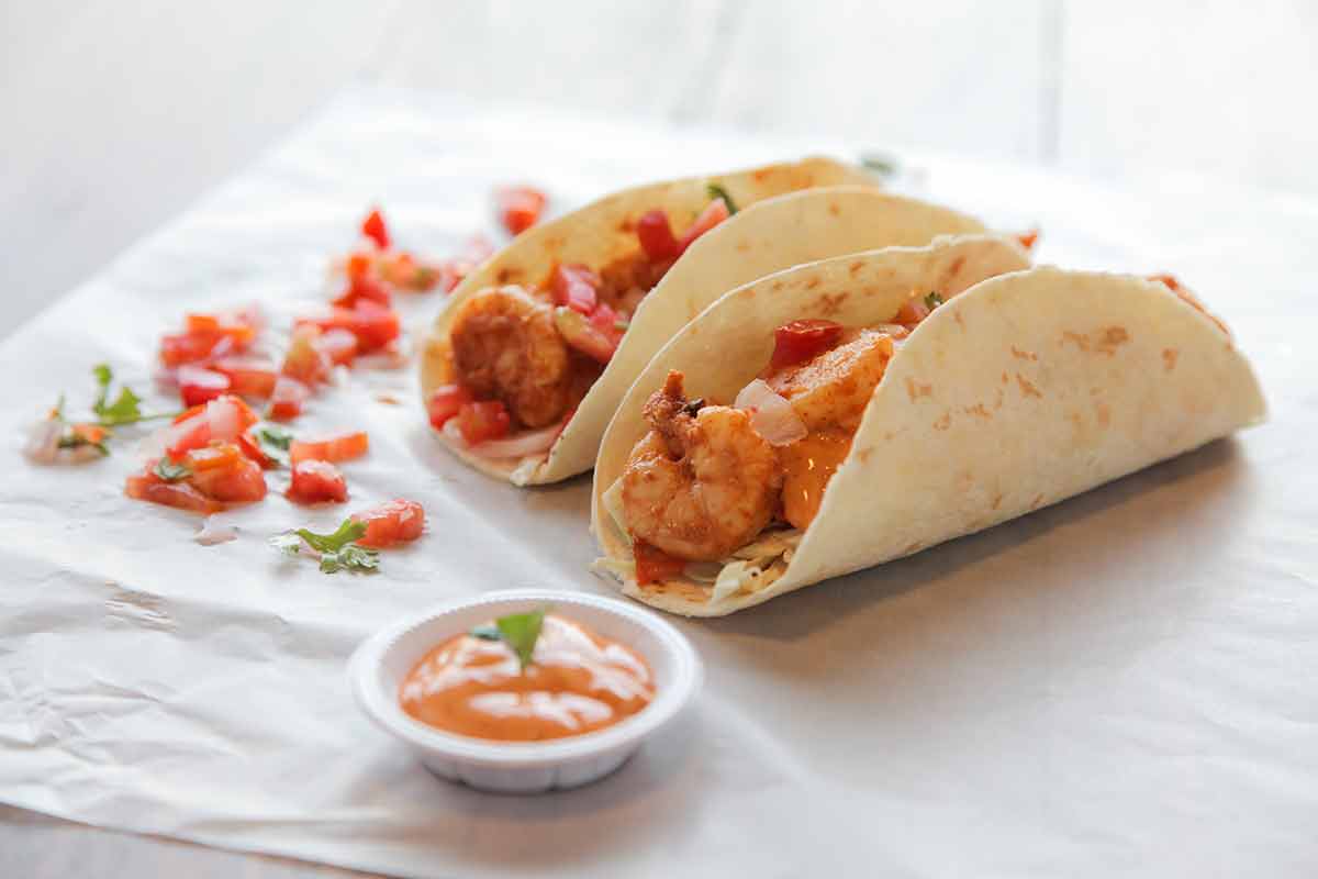 best things to do in acapulco mexico prawn tacos on paper