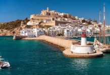 best things to do in ibiza during the day white and brown buildings on the hill