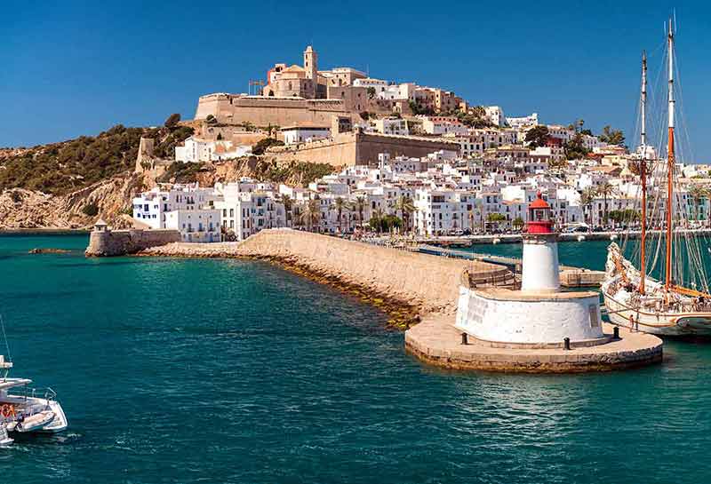 best things to do in ibiza during the day white and brown buildings on the hill