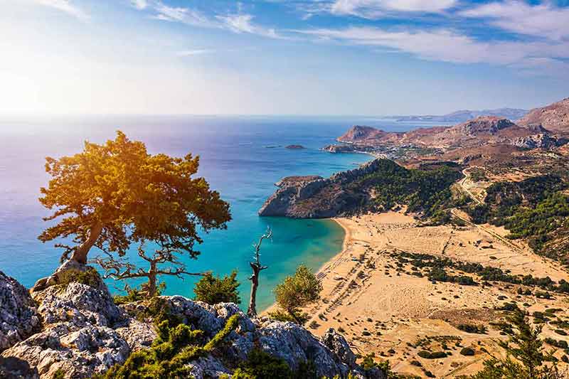 best things to do in rhodes Aerial birds eye view of famous beach of Tsampika, Rhodes island, Dodecanese, Greece.