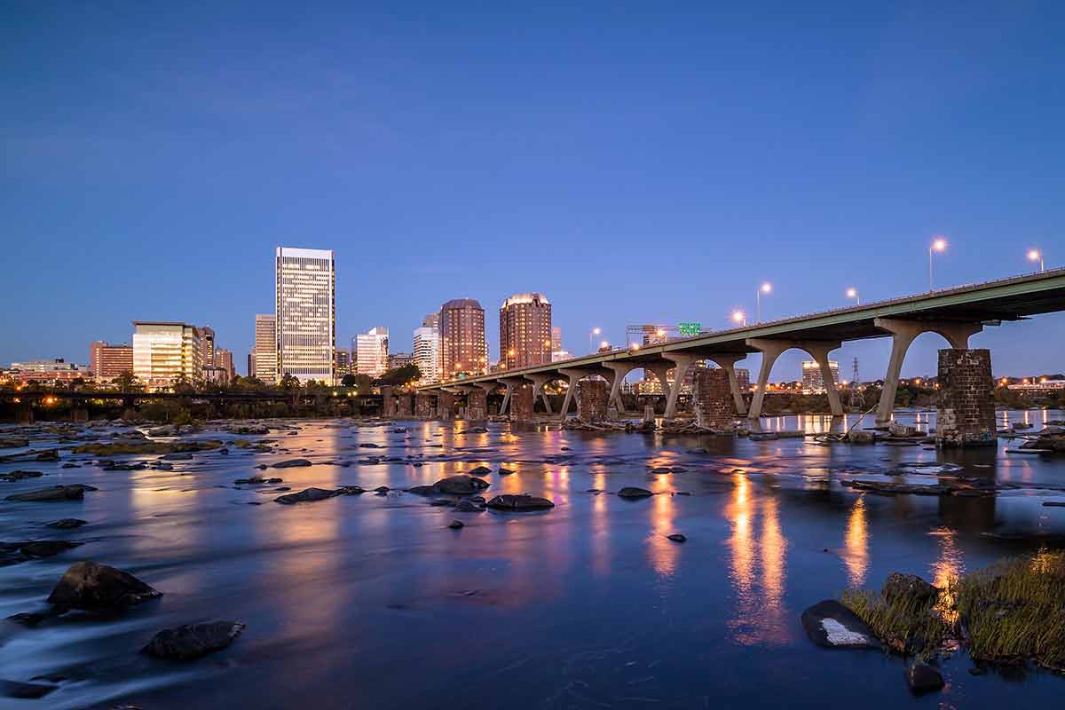 best things to do in richmond virginia Downtown Richmond, Virginia skyline and the James River at twilight.