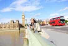 best time to see autumn leaves in london London travel woman tourist by Big Ben