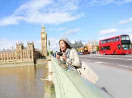 best time to see autumn leaves in london London travel woman tourist by Big Ben