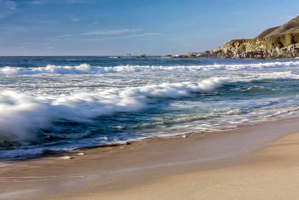 best time to visit California Bodega Bay waves on sand