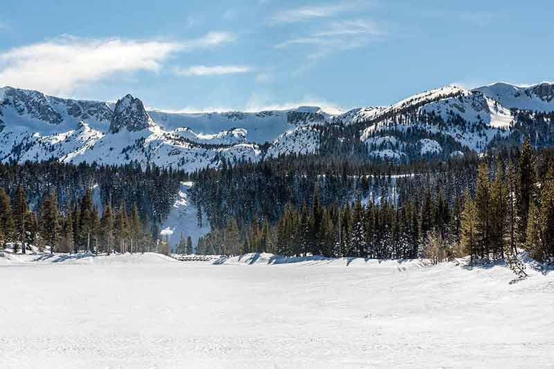 best time to visit California Mammoth Lakes snow-covered lake and mountains