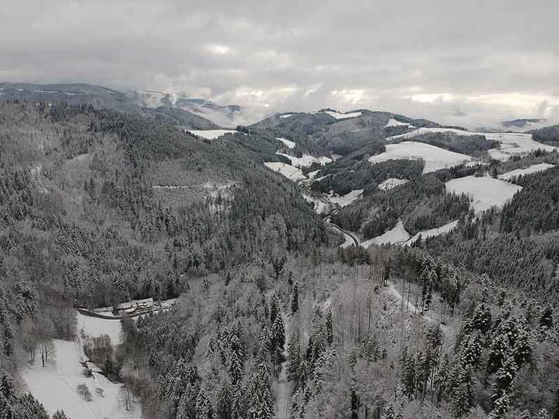 best time to visit black forest germany aerial view of snow-covered mountains