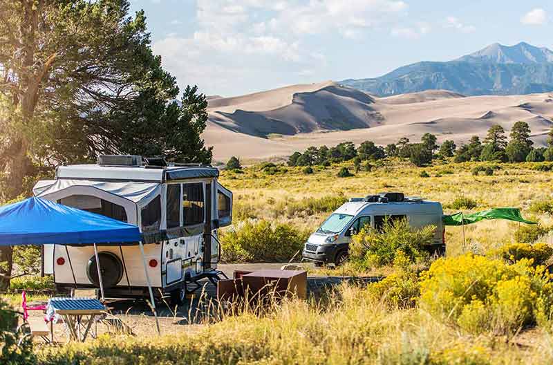 best time to visit colorado for camping with RV with the Great Sand Dunes in the background