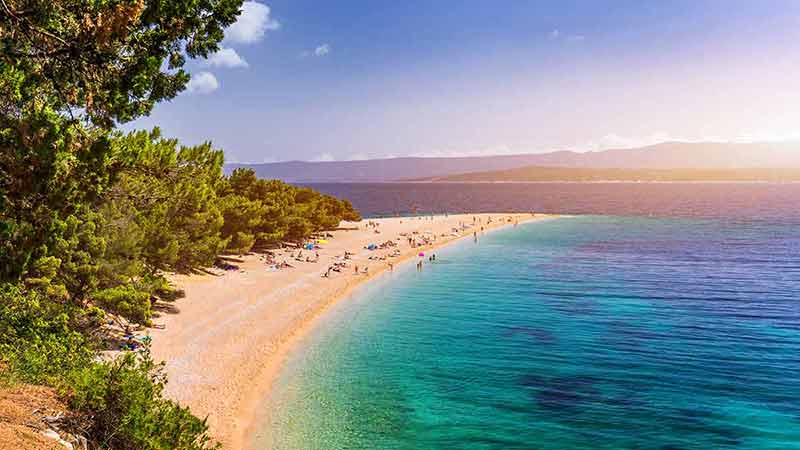 best time to visit croatia beaches blue water, sand and trees