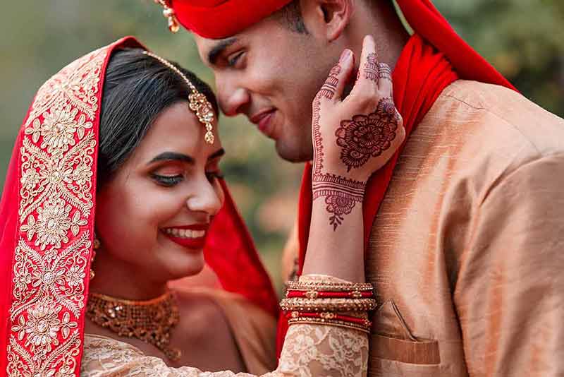 best time to visit in summer in india young hindu couple on their wedding day