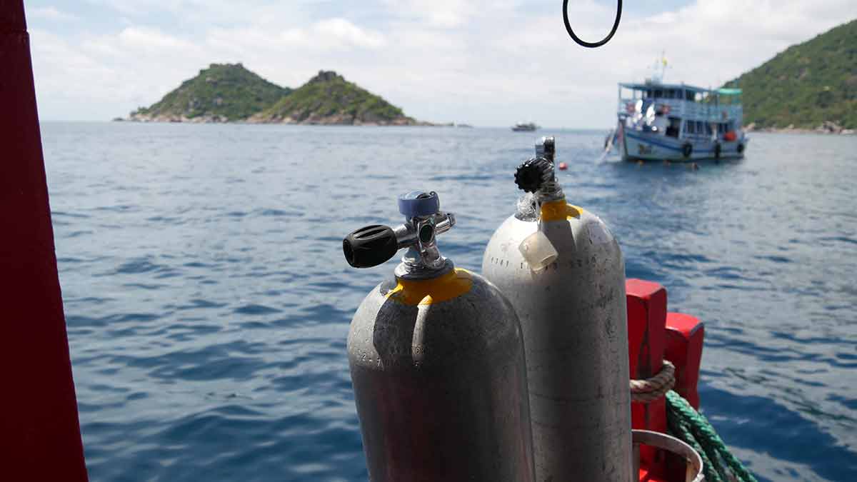 best time to visit thailand tripadvisor Row of oxygen tanks and diving equipment placed on modern boat in rippling ocean near Koh Tao resort, Thailand. Concept of tourist sports extreme entertainment, adventure and new experience