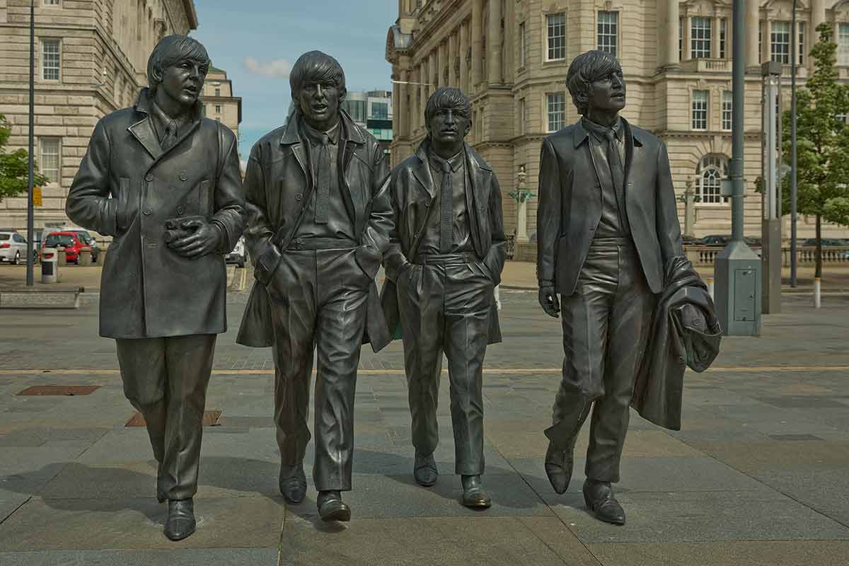 best time visit england bronze statue of the four Liverpool Beatles