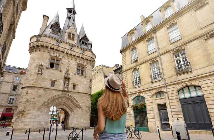 20 Best Hotels in Bordeaux That Will Make You Want to Move In woman admiring the architecture of Bordeaux