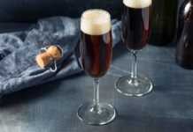 british drinks black velvet cocktail in champagne flutes