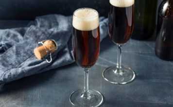 british drinks black velvet cocktail in champagne flutes