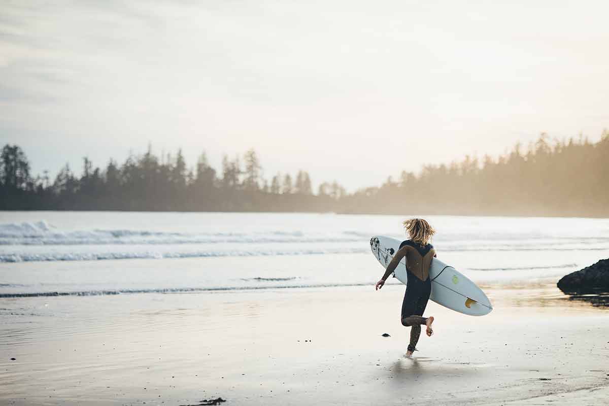 a surfer in one of the canada national parks, Long Beach