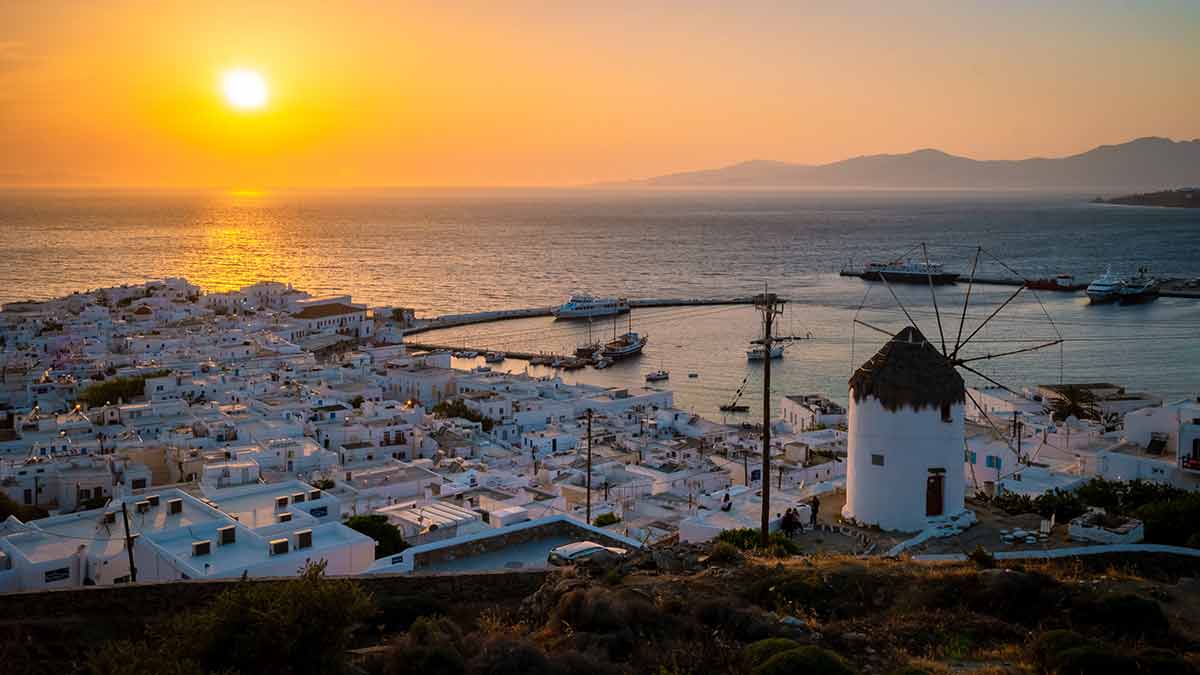 aerial view of Mykonos windmill, town and water
