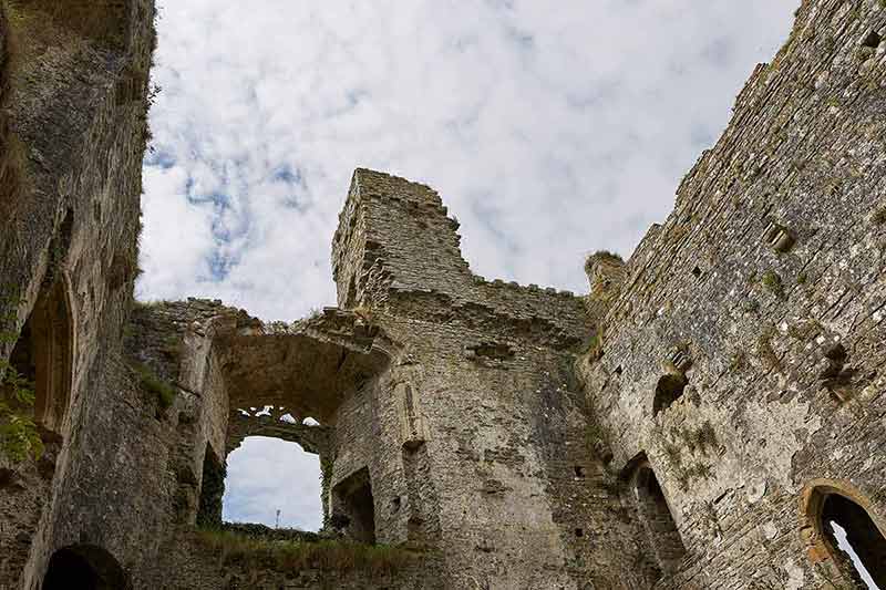 ruins of Carew Castle with clouds and sky
