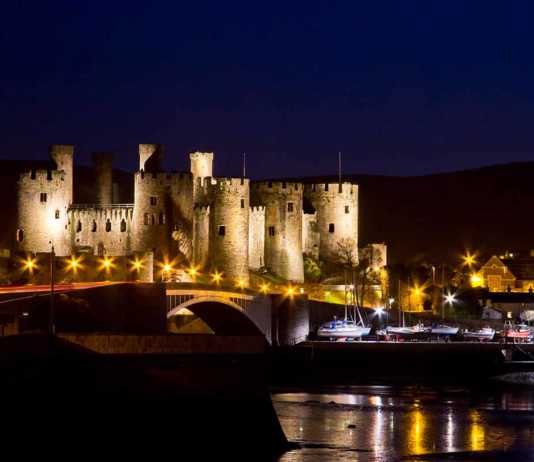 Conwy Castle at night is one of the top castles in wales to visit