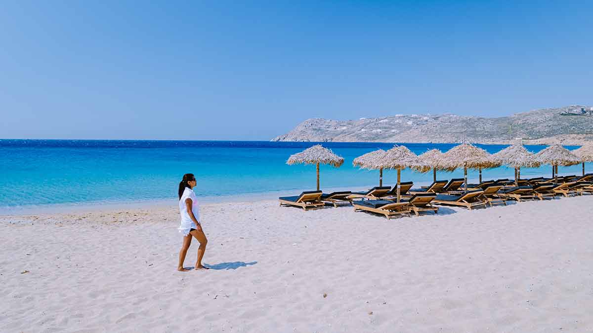 Young girl on the beach of Mykonos