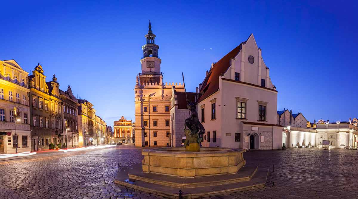cities in eastern poland night view of Poznan Old Market Square