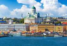 20 Beautiful Cities In Finland That Deserve A Spot On Your Bucket List cities in finland helsinki cathedral and waterfront on a blue-sky day