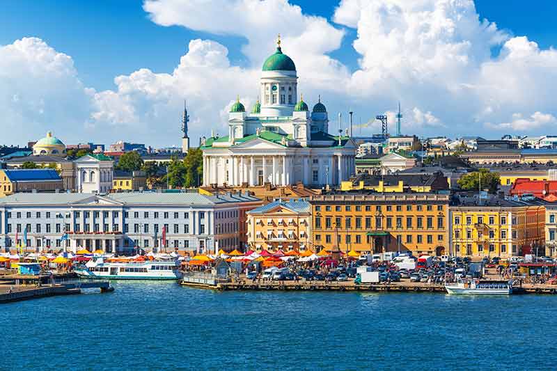 cities in finland helsinki cathedral and waterfront on a blue-sky day