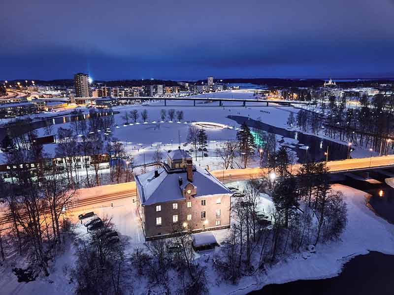 cities in finland to visit Joensuu aerial view at night in winter