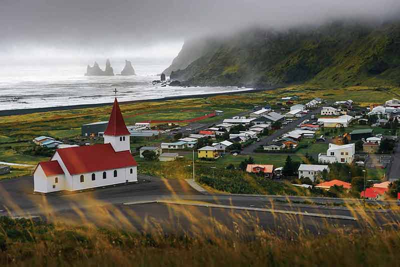 Heavy Clouds Over The Village Of Vik I Myrdal In Iceland