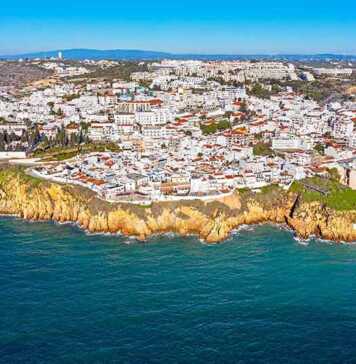 Albufeira in the Algarve Portugal aerial view of white city and cliffs
