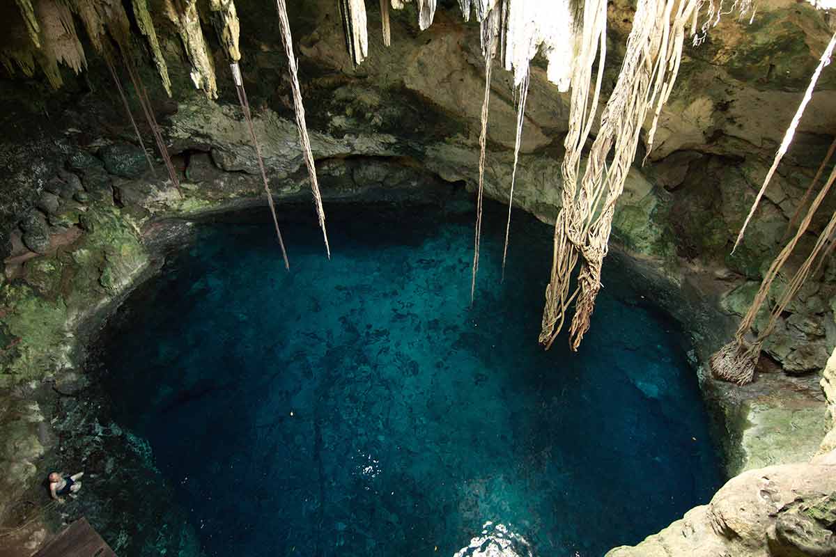cuzama Mexico cenote looking down into a blue pool