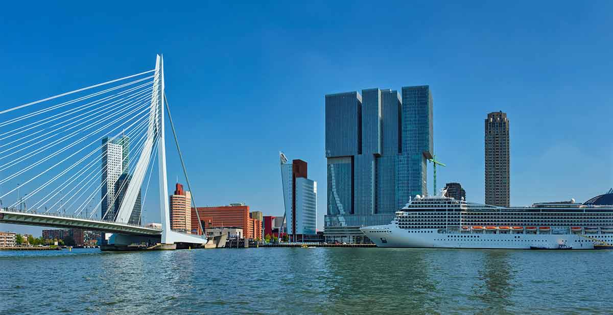 Panorama of Rotterdam cityscape with cruise liner