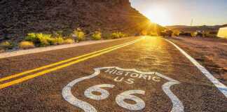 day trips from las vegas by car Street sign on historic route 66 in the Mojave desert.