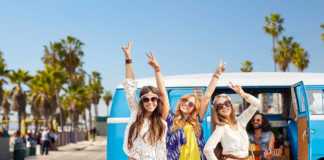 day trips from los angeles three girls outside a blue kombi van