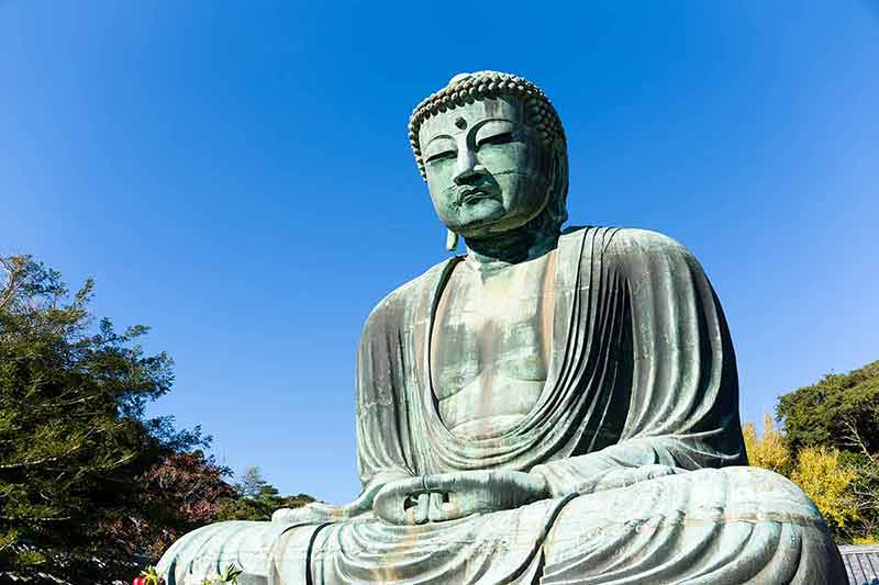 day trips from tokyo to kyoto Great Buddha of Kamakura with blue sky