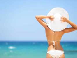 dominican republic beaches woman in white bikini and white hat